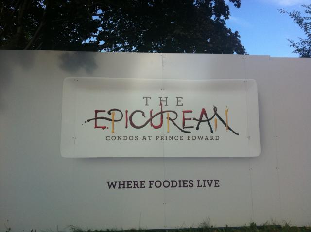Hoarding advertising for the Monarch Group's The Epicurean