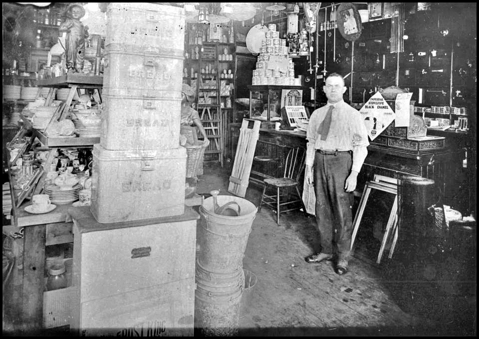 Ben Sherman in his family owned hardware store at Queen and Augusta ca. 1927.jpg