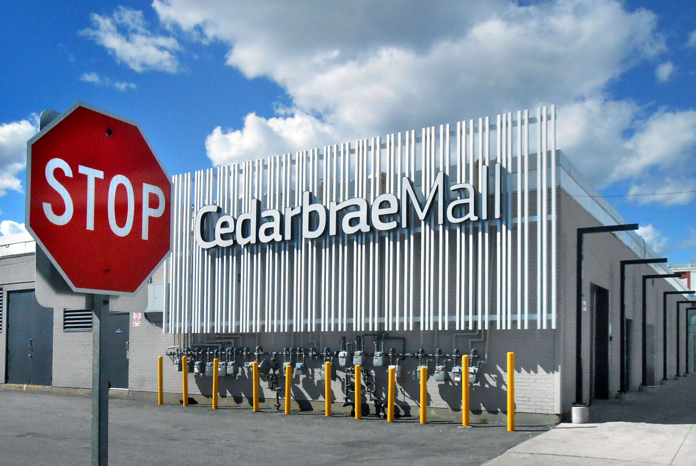 Cedarbrae Mall sign and stop sign.jpg