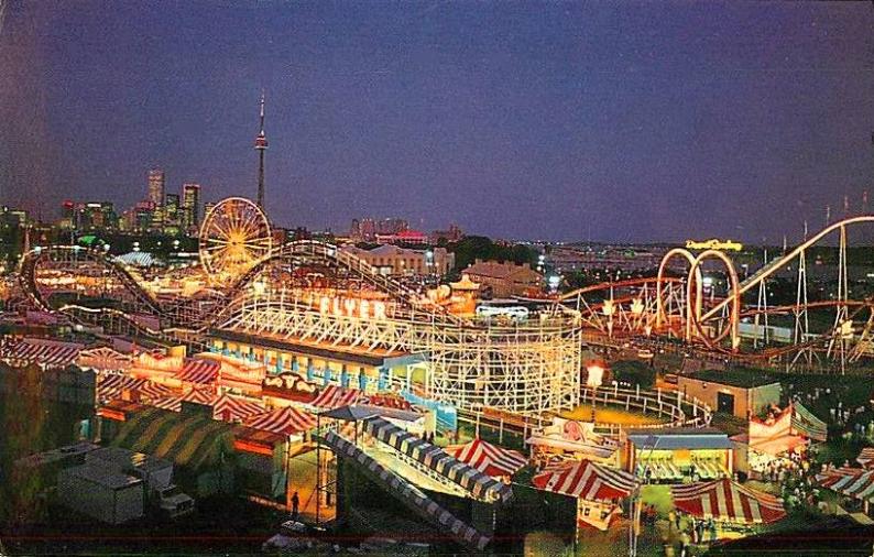 POSTCARD - TORONTO - EXHIBITION - NIGHT - MIDWAY AND RIDES - SKYLINE IN DISTANCE - 1989.jpg