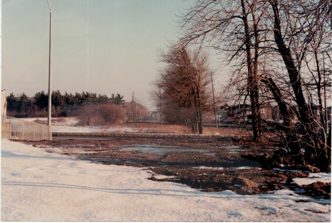 South down Fifth Line across Thomas Street, winter 1990-1991.png