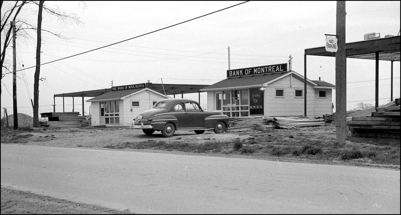 Temporary %22frontier style%22 wooden shacks for Bank of Montreal and Bank of Nova Scotia, S. ...jpg